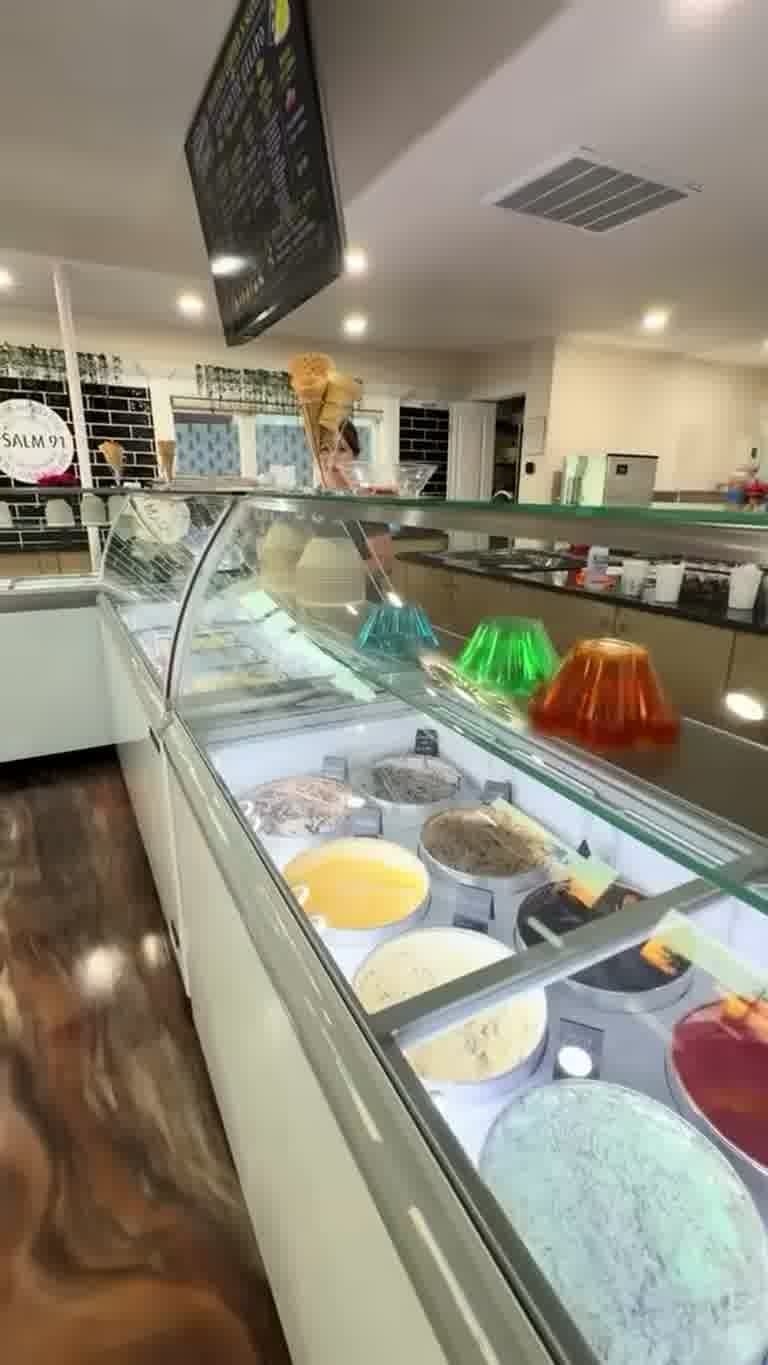 Heavenli gelato display case filled with colorful flavors